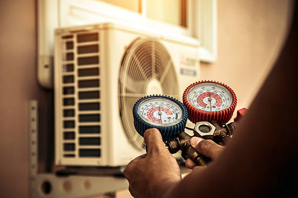 Professional Heat Pump Repair technician working in Creve Coeur, MO